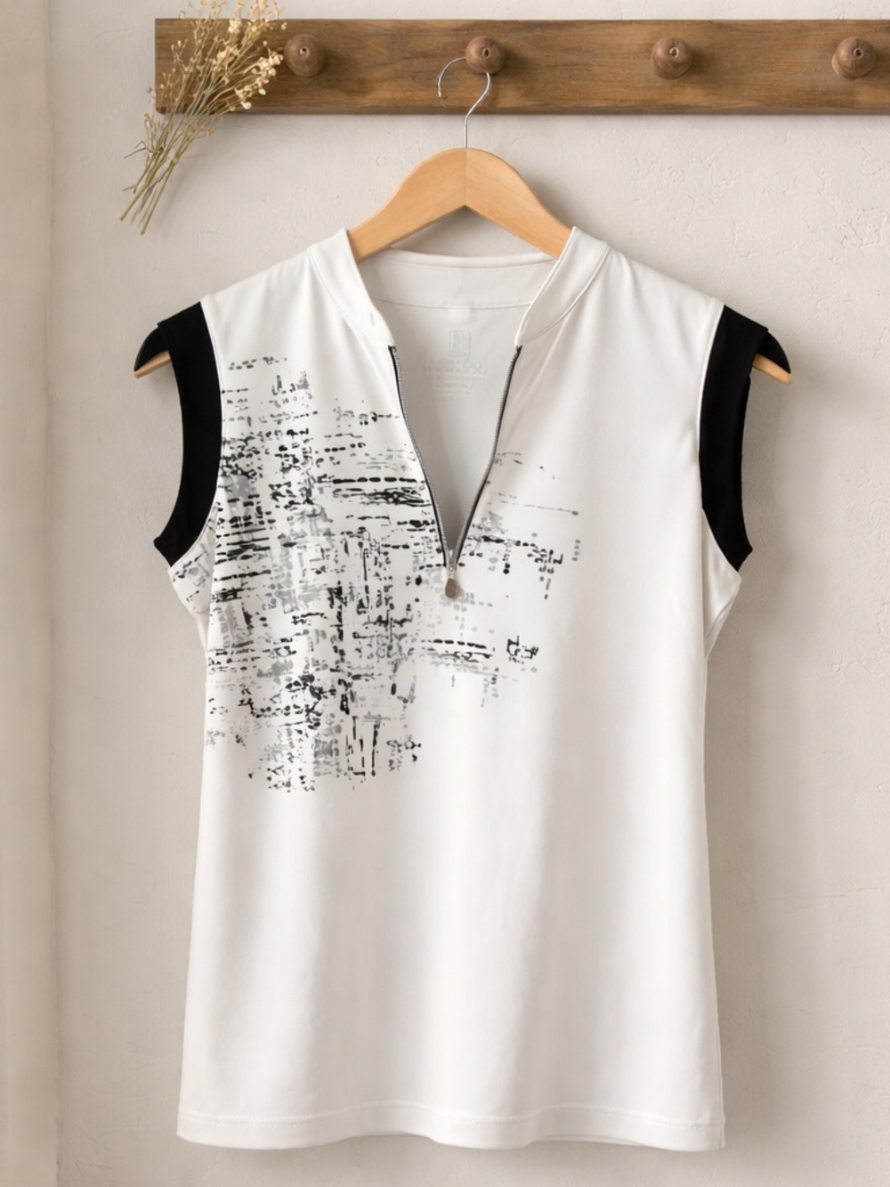 Sleeveless White Tank Top with Black Accents and Zip-Front